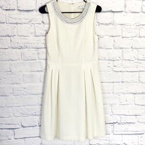 Trina Turk cream beaded neckline pleated sleeveless dress 6